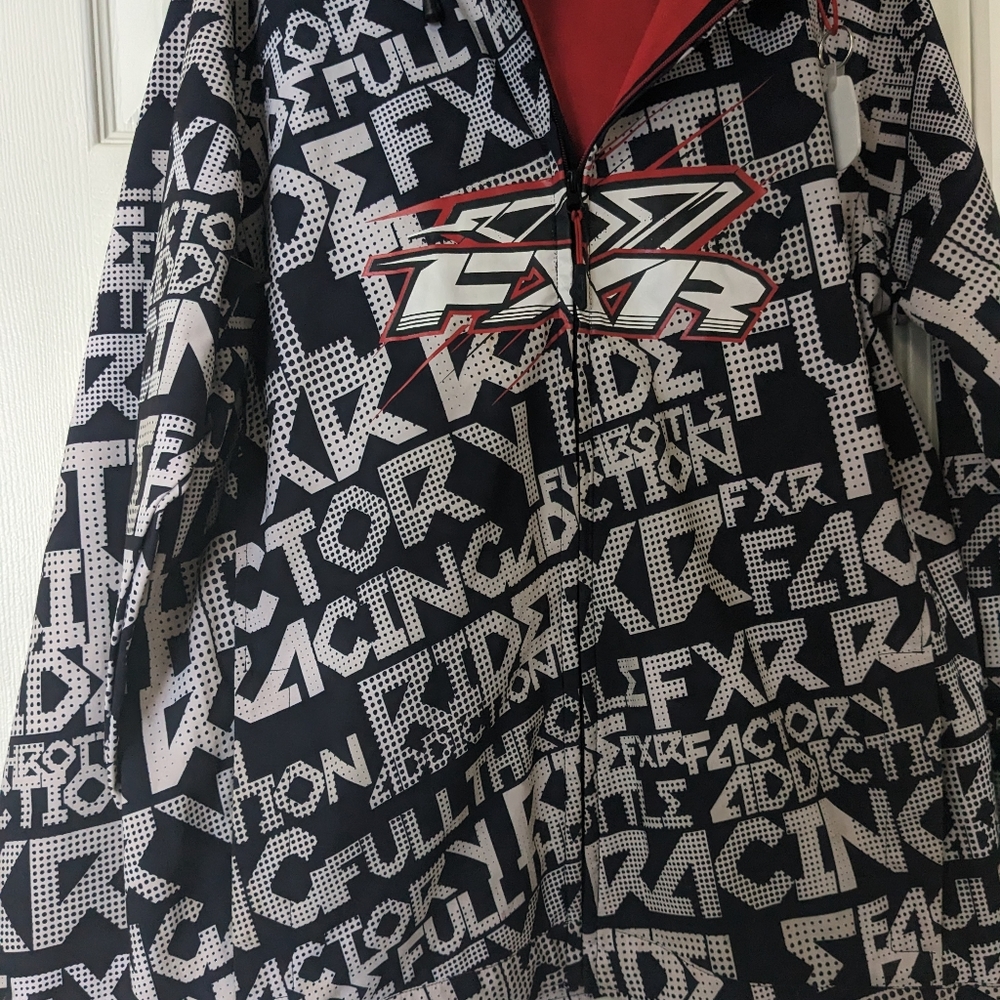 Woman's FXR Riding Jacket. With hood.  Worn once on a vacation. Size  Large